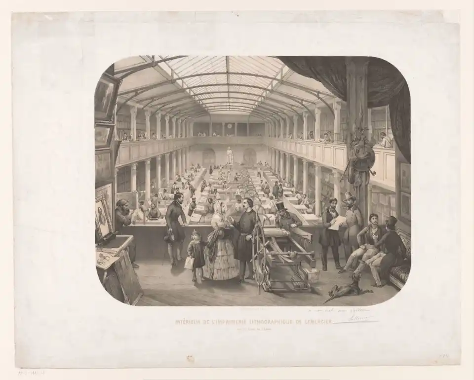 Print of a busy lithographic workshop, with workers preparing stones and operating presses beneath tall windows.